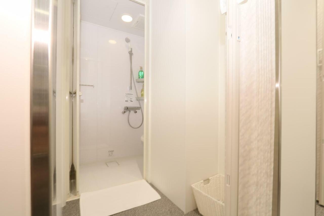 Business Capsule Hotel Lightning Hotel Asakusa Токио Экстерьер фото