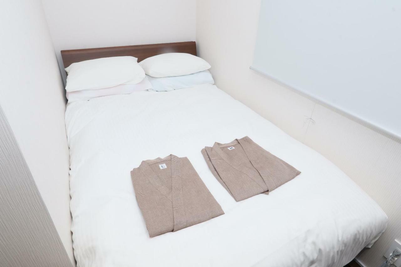 Business Capsule Hotel Lightning Hotel Asakusa Токио Экстерьер фото