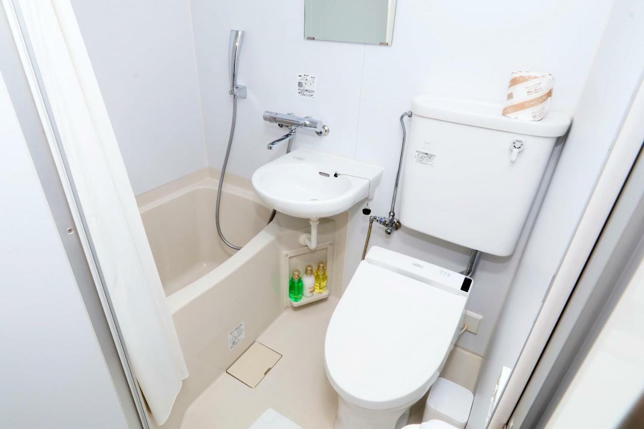 Business Capsule Hotel Lightning Hotel Asakusa Токио Экстерьер фото